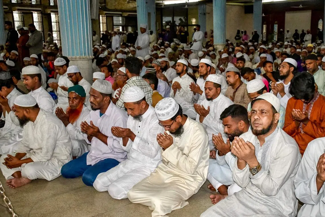 Muslims offer a special prayer at the Baitul Mukarram National Mosque in Dhaka on July 25, 2025, for the victims of the tragic plane crash at the Milestone School and College.  