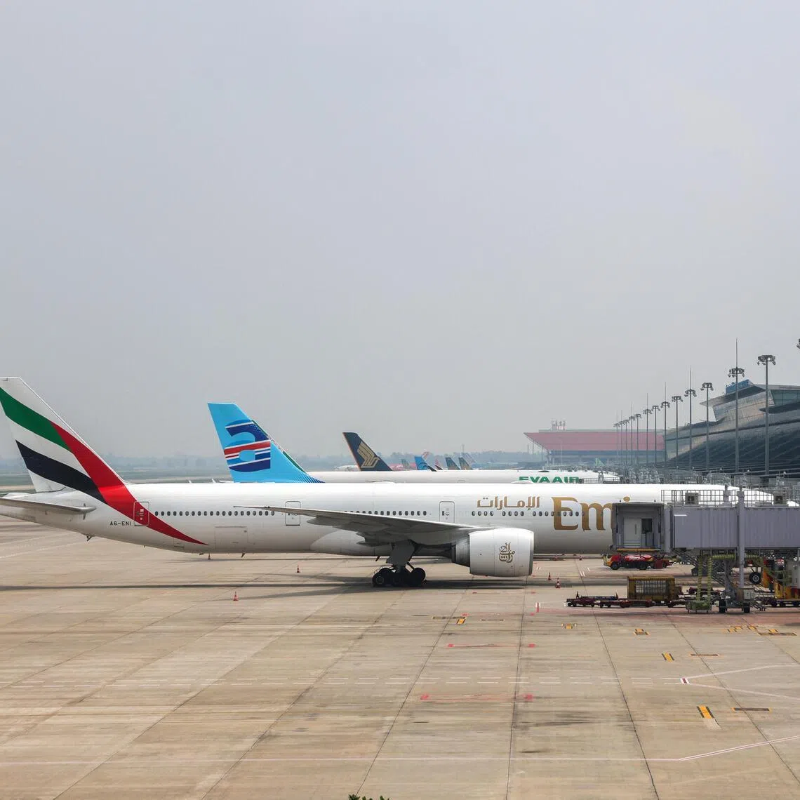 Planes are parked at Hanoi’s airport amid airspace closures following a simmering conflict in the Middle East.