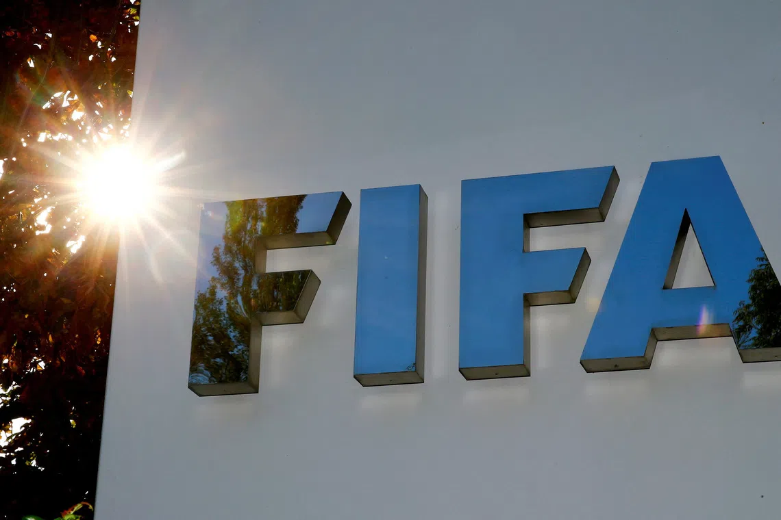 FILE PHOTO: The logo of FIFA is seen in front of its headquarters in Zurich, Switzerland September 26, 2017.   REUTERS/Arnd Wiegmann/File Photo