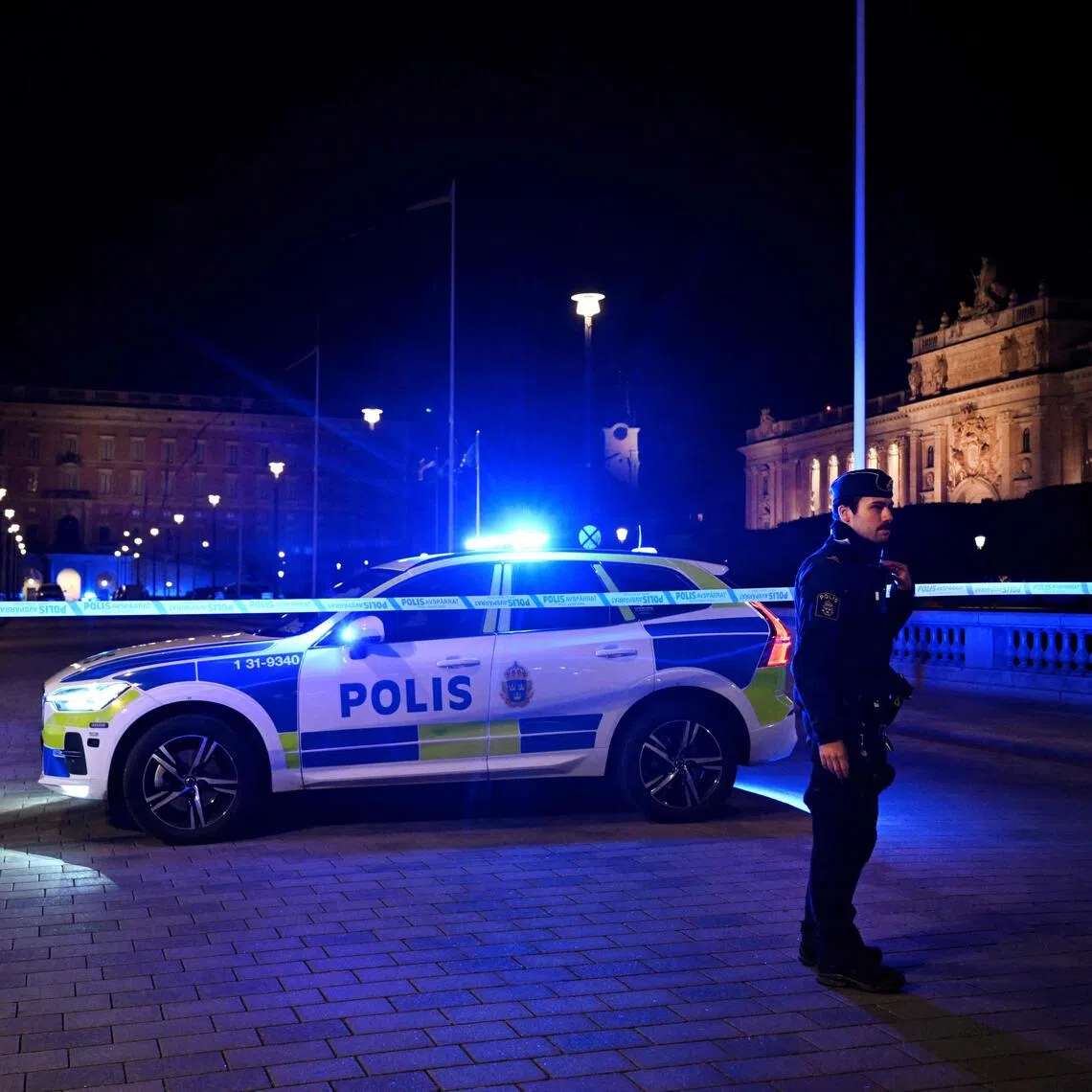 A police cordon in place after officers shot a man armed with a knife near the Royal Palace in central Stockholm, on Oct 6.