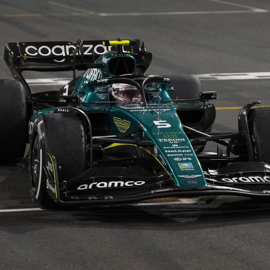 Formula One F1 - Abu Dhabi Grand Prix - Yas Marina Circuit, Abu Dhabi, United Arab Emirates - November 20, 2022 Aston Martin's Sebastian Vettel crosses the line in his last Formula One race REUTERS/Aleksandra Szmigiel