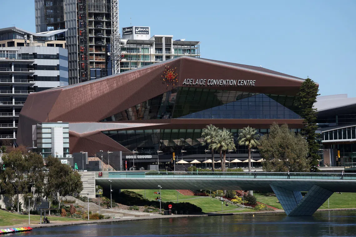 FILE PHOTO: The Adelaide Convention Centre, proposed as the primary venue for Australia’s bid to host the COP31 climate change conference, overlooks the River Torrens in Adelaide, Australia, September 18, 2025. REUTERS/Hollie Adams./File Photo