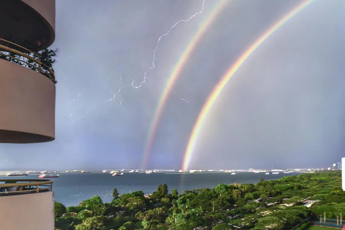 aqrainbow21 - A double rainbow outside Mr Simon Lim's balcony at Neptune Court in Marine Parade on Friday at 7.30am. Mr Lim is part of the #sgstormtrackers, a group of enthusiasts that chase lightning.

to be credited to Simon Lim Yik