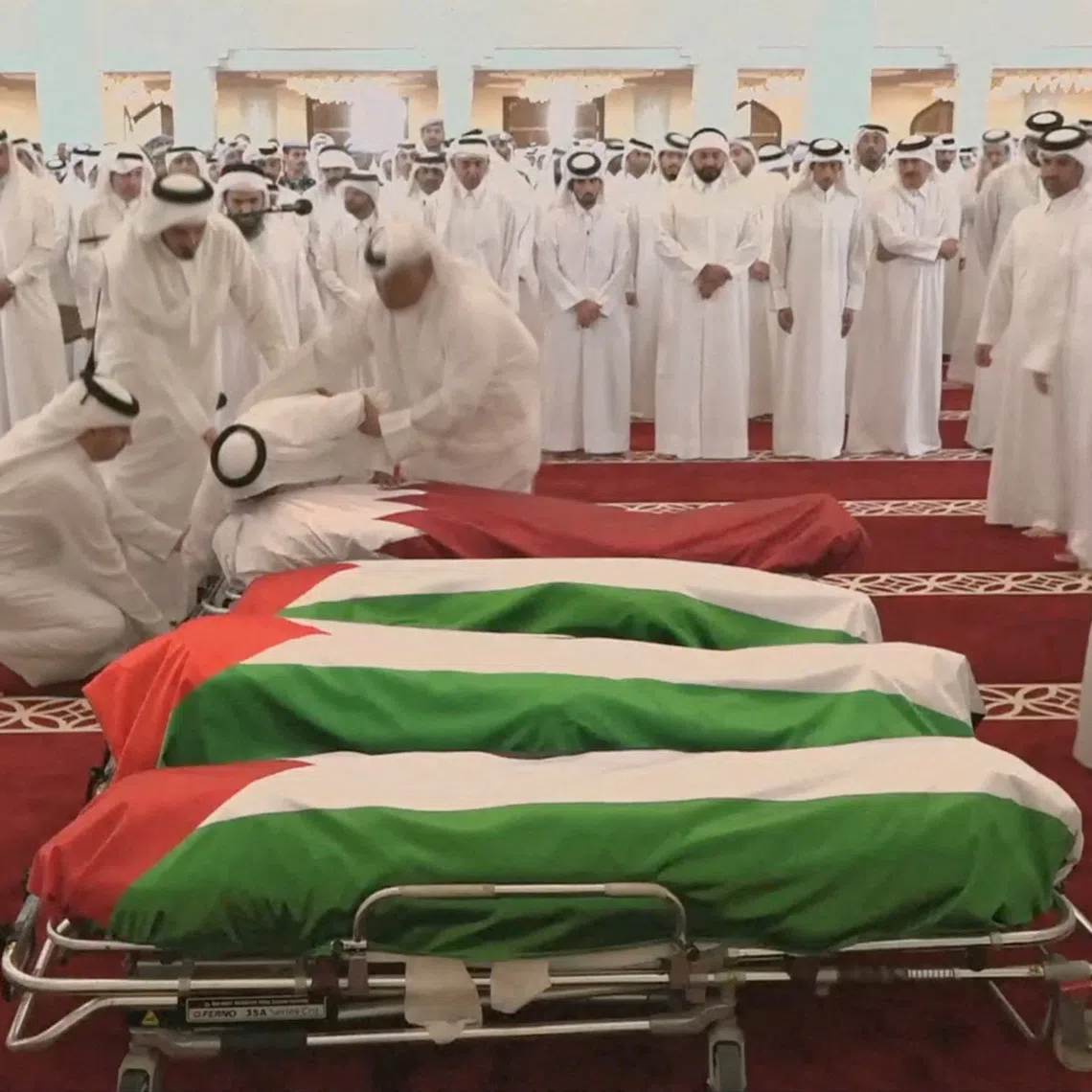People attend a funeral on Sept 11 held for those killed by an Israeli attack in Doha on Sept 8.