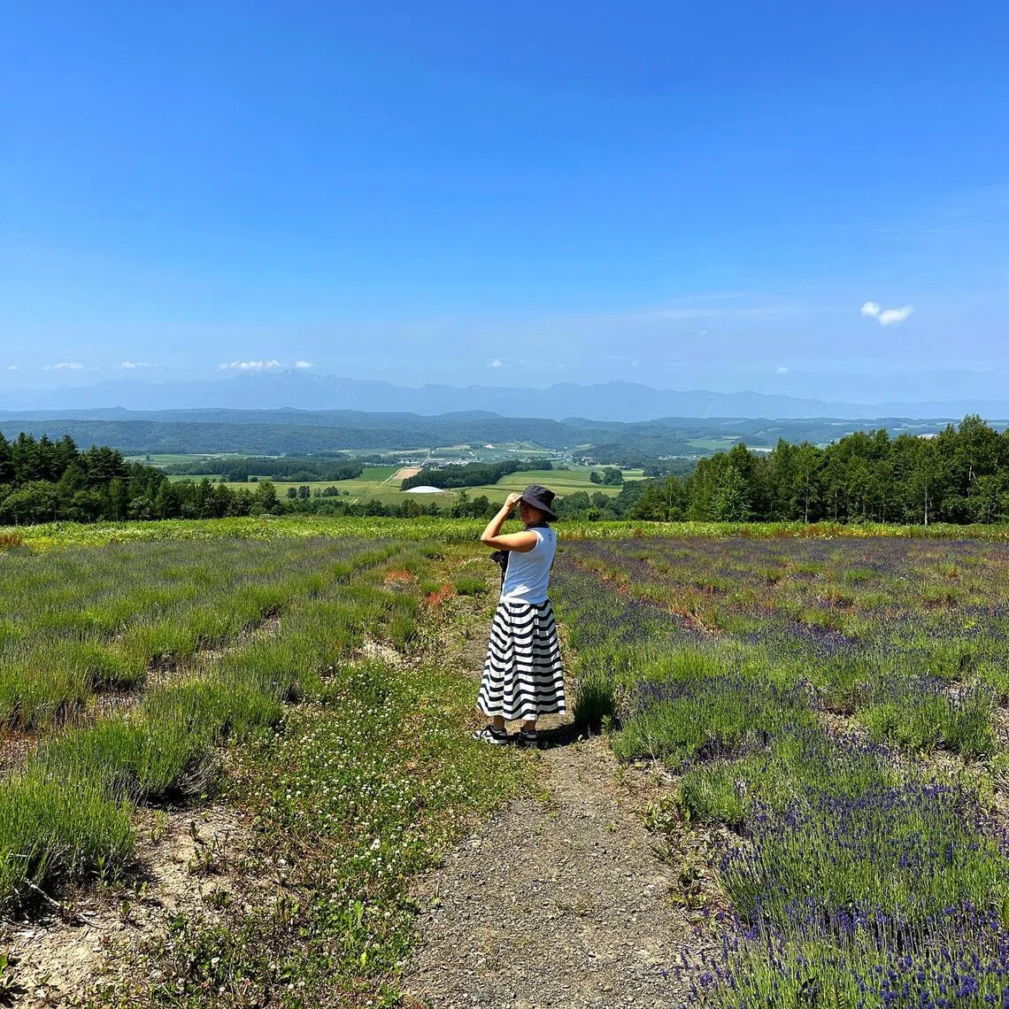 The writer at Kyohsai Farm in Furano. While the mercury rises in many parts of Japan, summer in Hokkaido tends to be milder than the rest of the country.