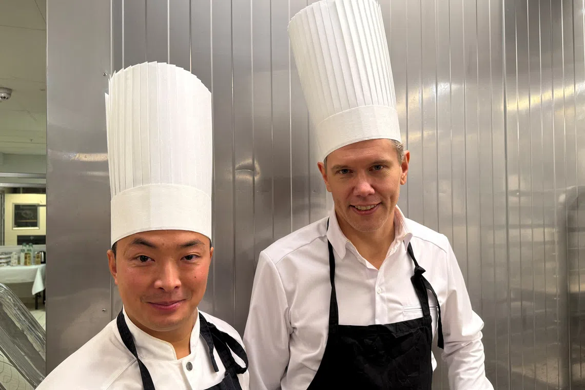 الطهاة بي لو وتومي ميلماكي (رويترز). 