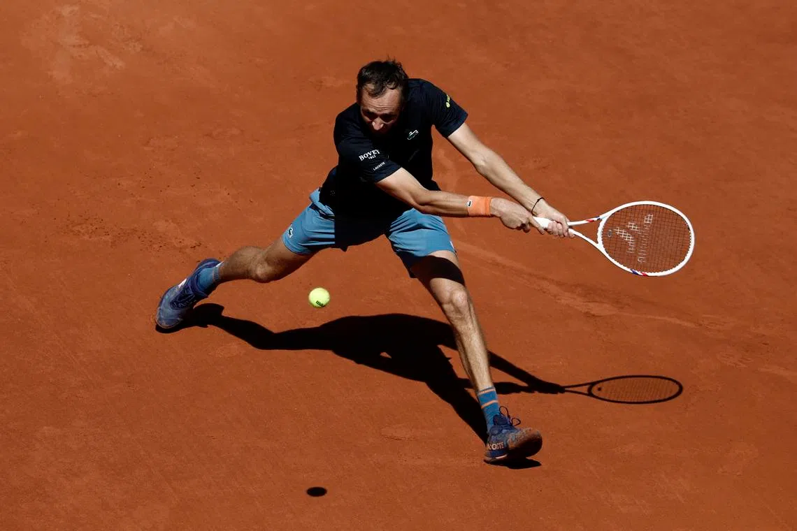 Tennis - French Open - Roland Garros, Paris, France - May 26, 2026 Russia's Daniil Medvedev in action during his first round match against Australia's Adam Walton REUTERS/Benoit Tessier