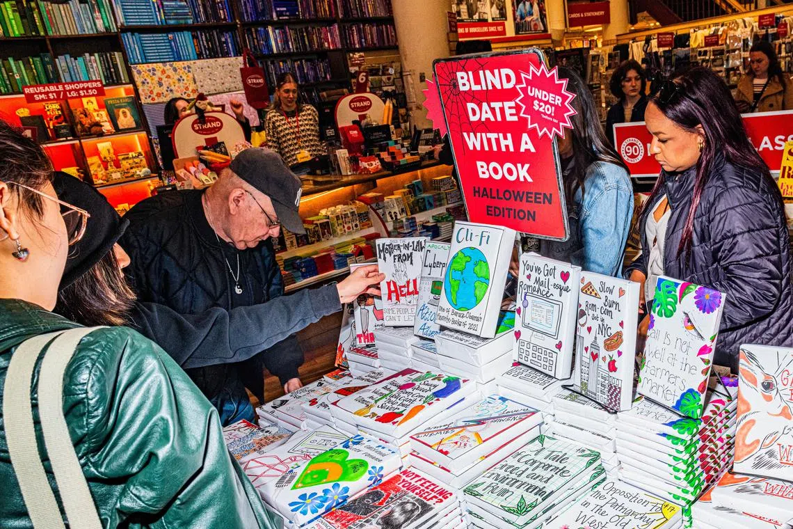 The Blind Date with a Book display at Strand Book Store in New York. Bookstores say that the concept, which masks a book's real cover, is beloved by customers.