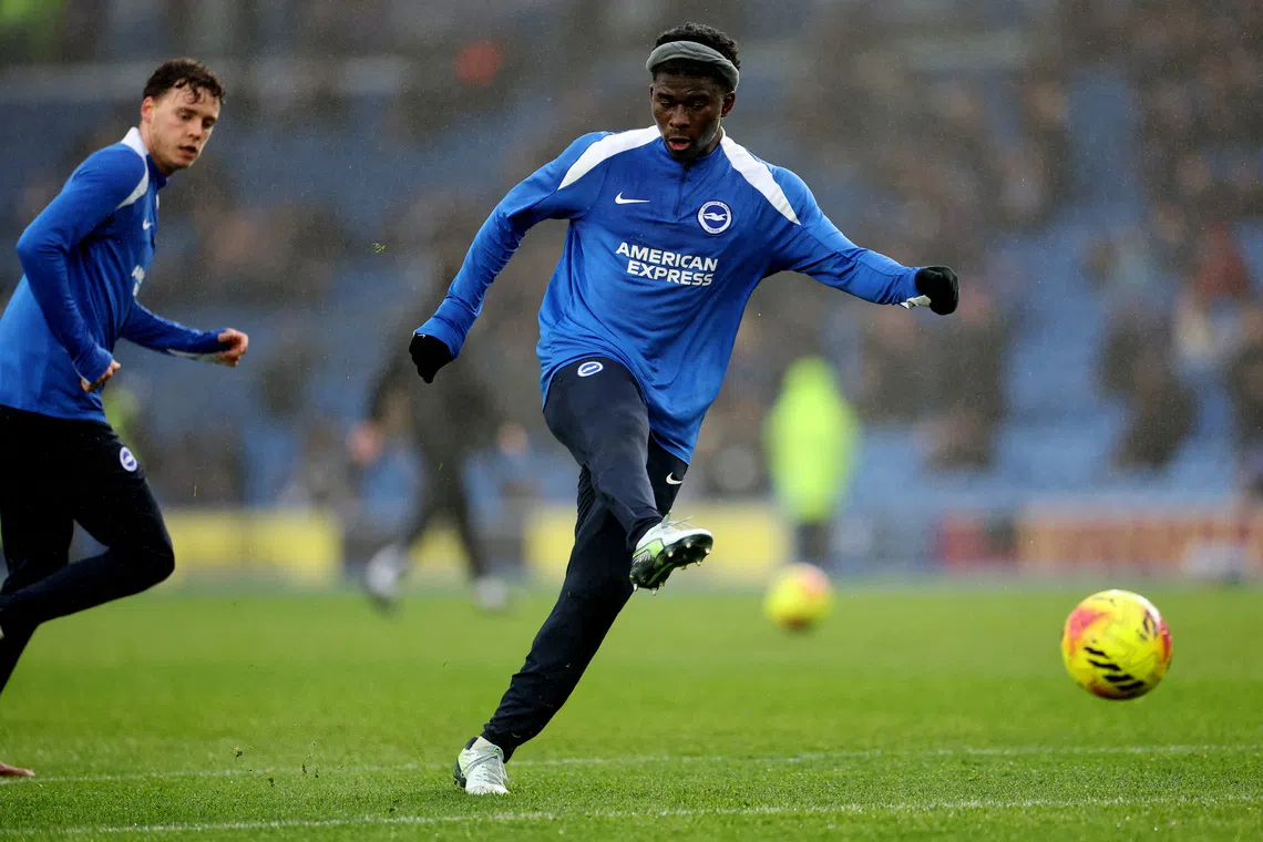 Soccer Football - Premier League - Brighton & Hove Albion v West Ham United - The American Express Community Stadium, Brighton, Britain - December 7, 2025 Brighton & Hove Albion's Carlos Baleba during the warm up before the match REUTERS/Toby Melville