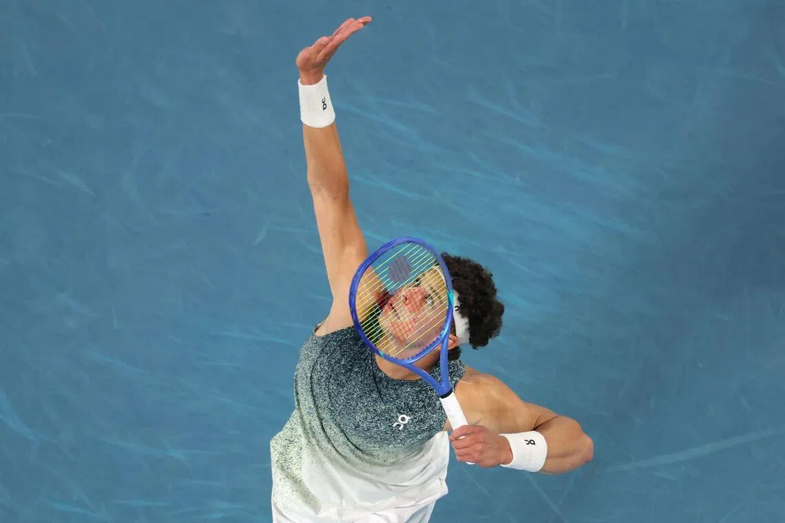 USA's Ben Shelton serves against Norway's Casper Ruud in their last-16 clash at the Australian Open.