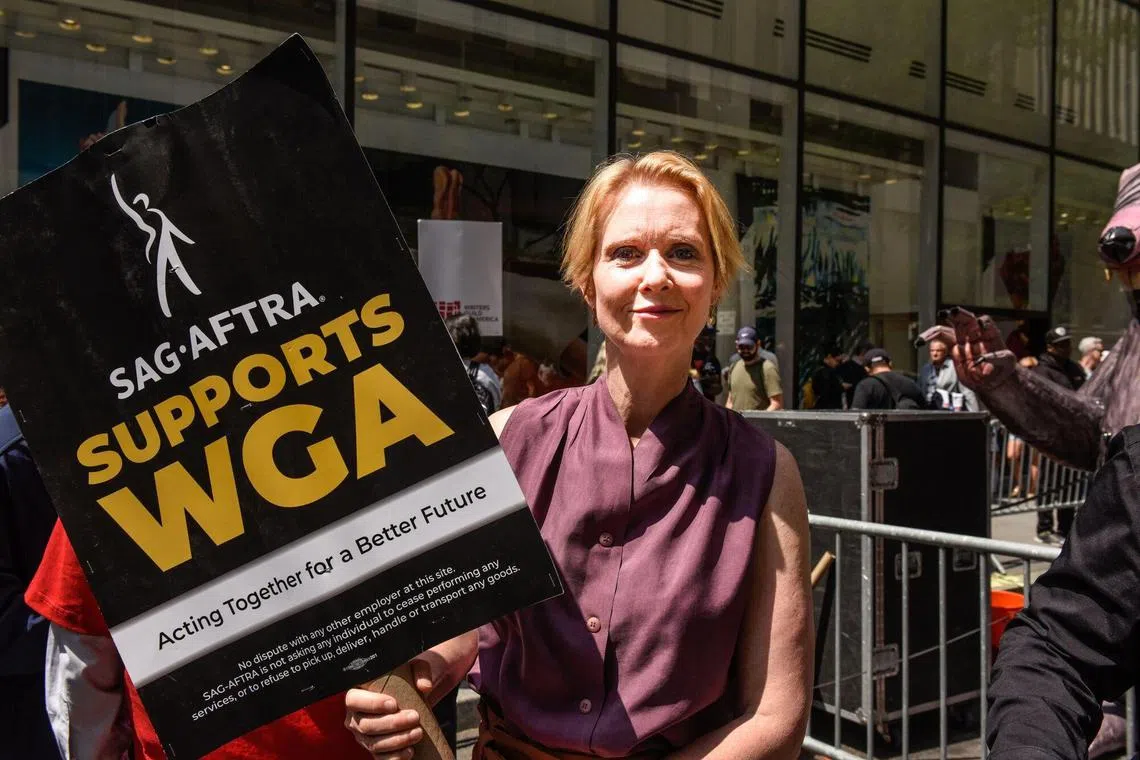 Actor Cynthia Nixon joined Writers Guild of America members and supporters on a picket line in New York on May 23.