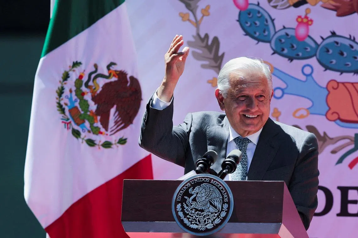 FILE PHOTO: Mexico's President Andres Manuel Lopez Obrador gestures during an event to mark the 86th anniversary of the expropriation of foreign oil firms, at PEMEX headquarters in Mexico City, Mexico. March 18, 2024. REUTERS/Raquel Cunha/File Photo