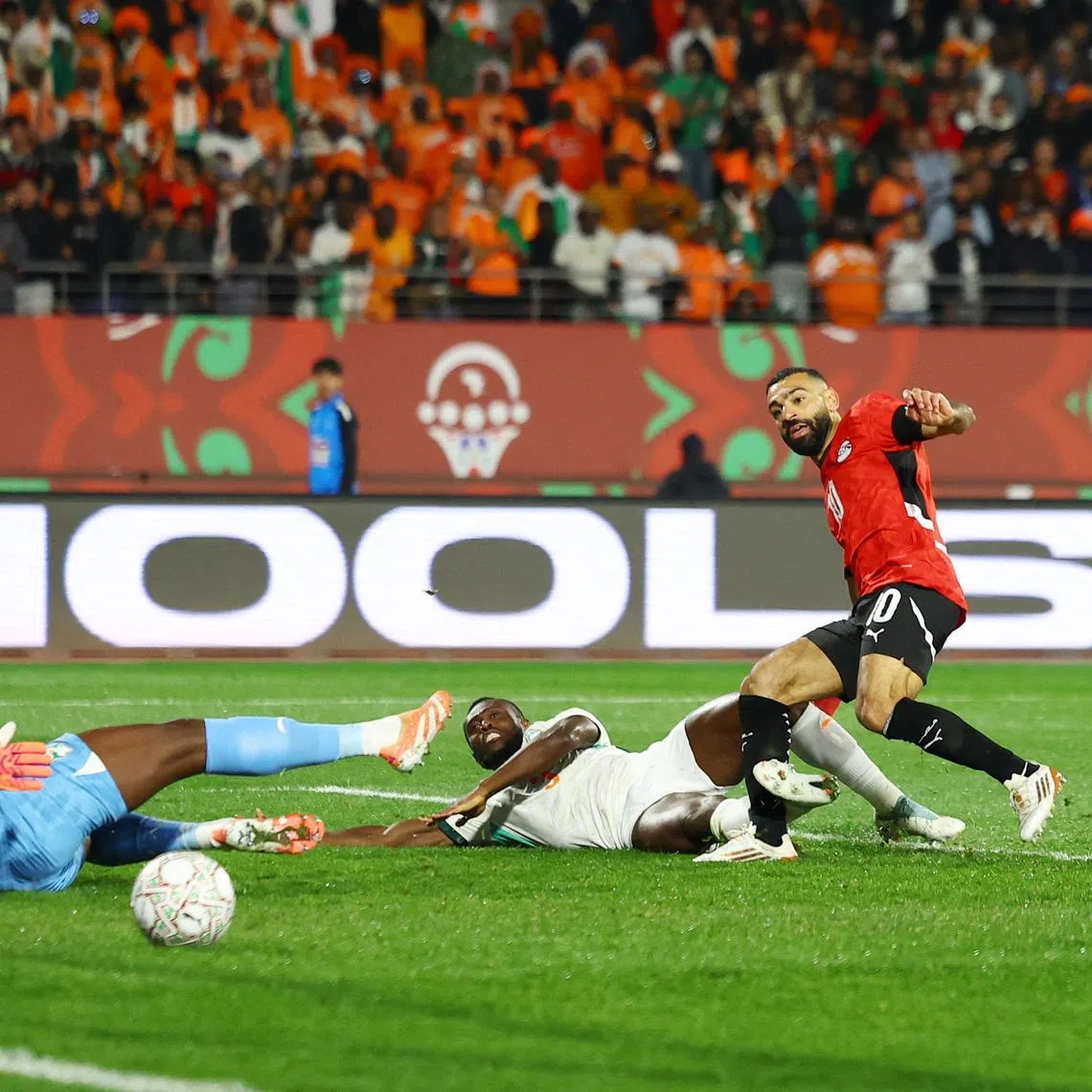 Soccer Football - CAF Africa Cup of Nations - Morocco 2025 - Quarter Final - Egypt v Ivory Coast - Adrar Stadium, Agadir, Morocco - January 10, 2026 Egypt's Mohamed Salah scores their third goal REUTERS/Siphiwe Sibeko