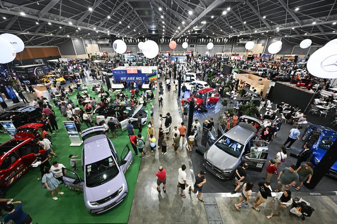 ST20240413-202497341066-Lim Yaohui-Esther Loi-elcar13/
Crowd at Car Expo at Singapore Expo on Apr 13, 2024.
Car Expo returns for its biggest post-Covid show on the weekend of April 13 and 14. The Car Expo is a mega automotive show that provides car buyers with attractive and great deals for brand new and pre-owned cars, and motoring accessories.
A new EV car brand, GAC Aion will be participating and launching 3 new car models at the show.
(ST PHOTO: LIM YAOHUI)
