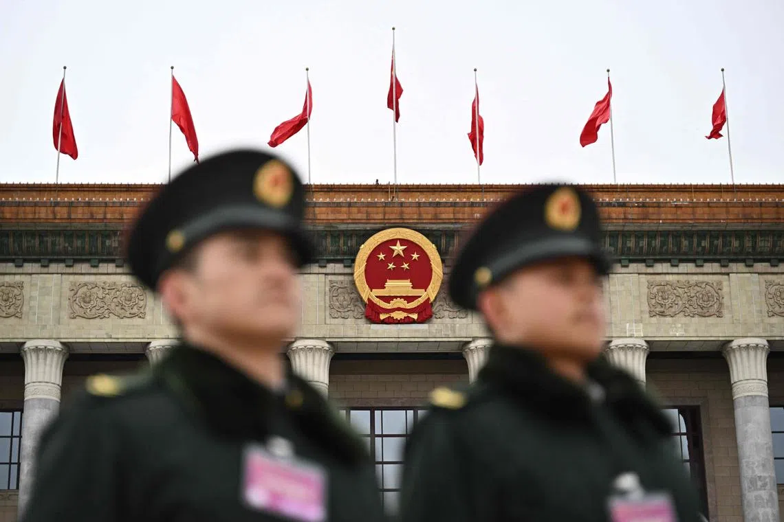 PLA soldiers standing guard outside the Great Hall of the People in Beijing on March 3.
