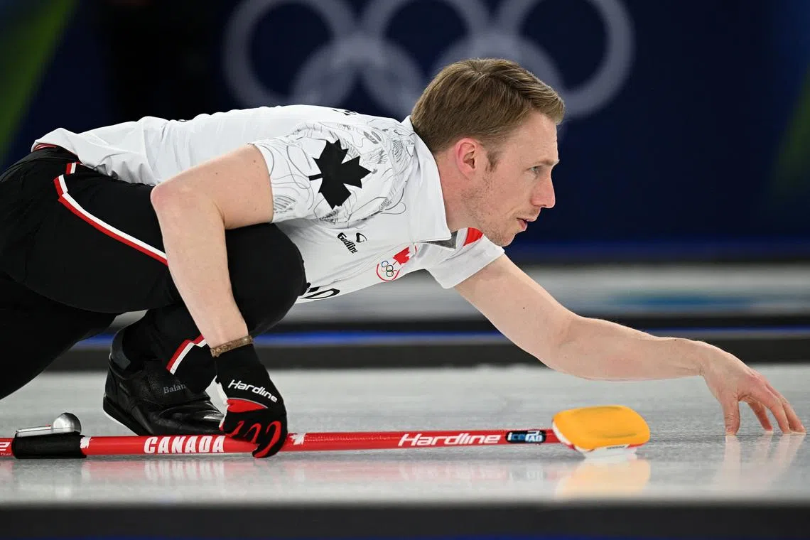 Milano Cortina 2026 Olympics - Curling - Men's Round Robin Session 5 - Switzerland vs Canada - Cortina Curling Olympic Stadium, Cortina d'Ampezzo, Italy - February 14, 2026. Marc Kennedy of Canada looks on during their match against Switzerland REUTERS/Jennifer Lorenzini