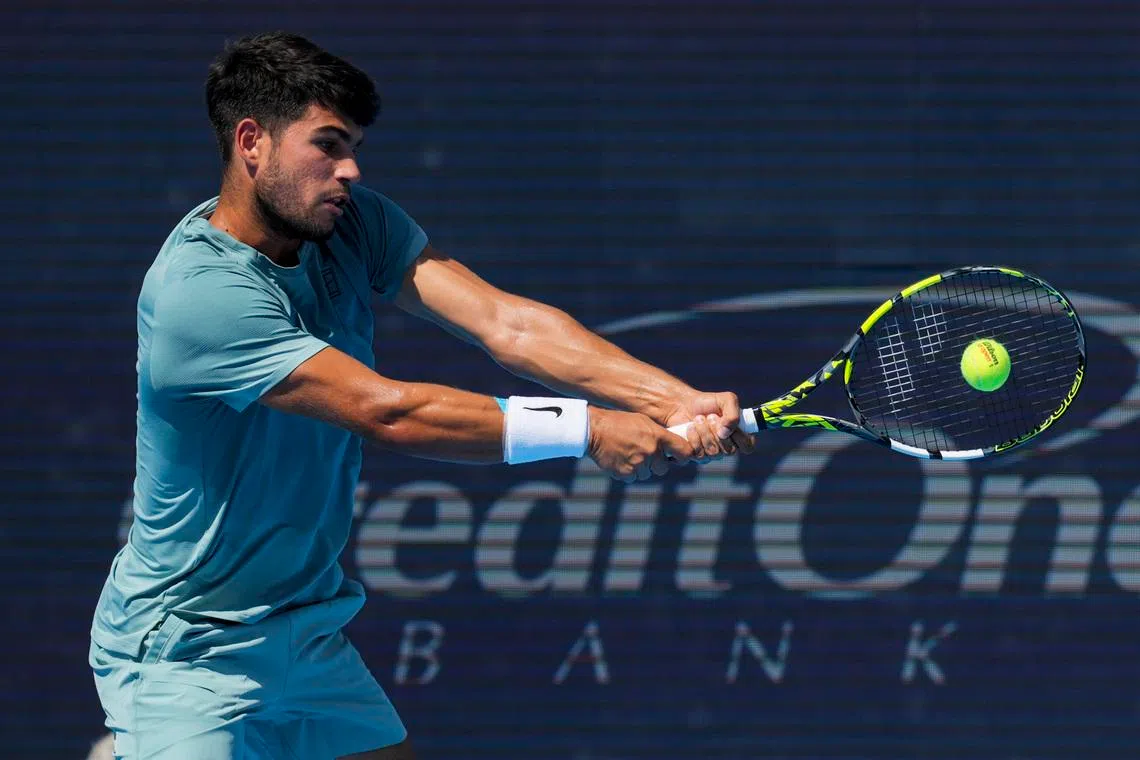 Aug 18, 2025; Cincinnati, OH, USA;  Carlos Alcaraz (ESP) returns a shot against Jannik Sinner (ITA) during the Cincinnati Open at the Lindner Family Tennis Center. Mandatory Credit: Aaron Doster-Imagn Images/File Photo