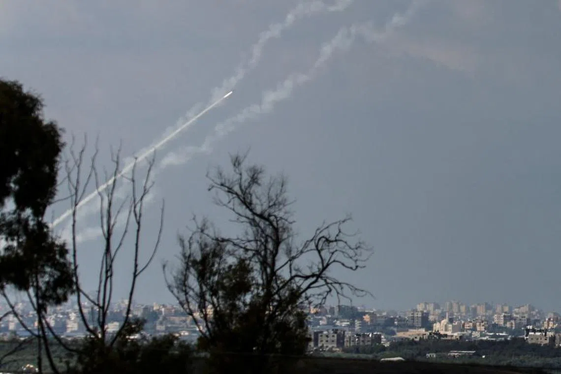 Rockets are launched from the Gaza Strip into Israel, as seen from Israel's border, in southern Israel October 16, 2023. REUTERS/Amir Cohen