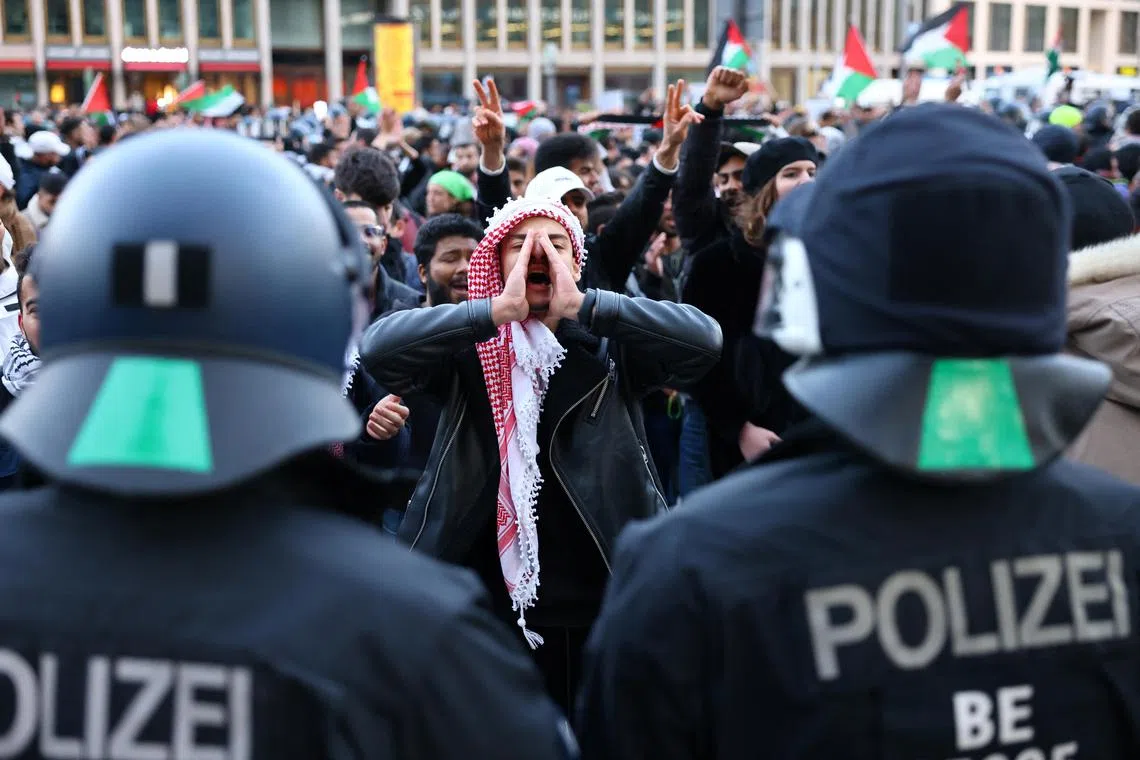 Pro-Palestinian demonstrators protest in Berlin, Germany.