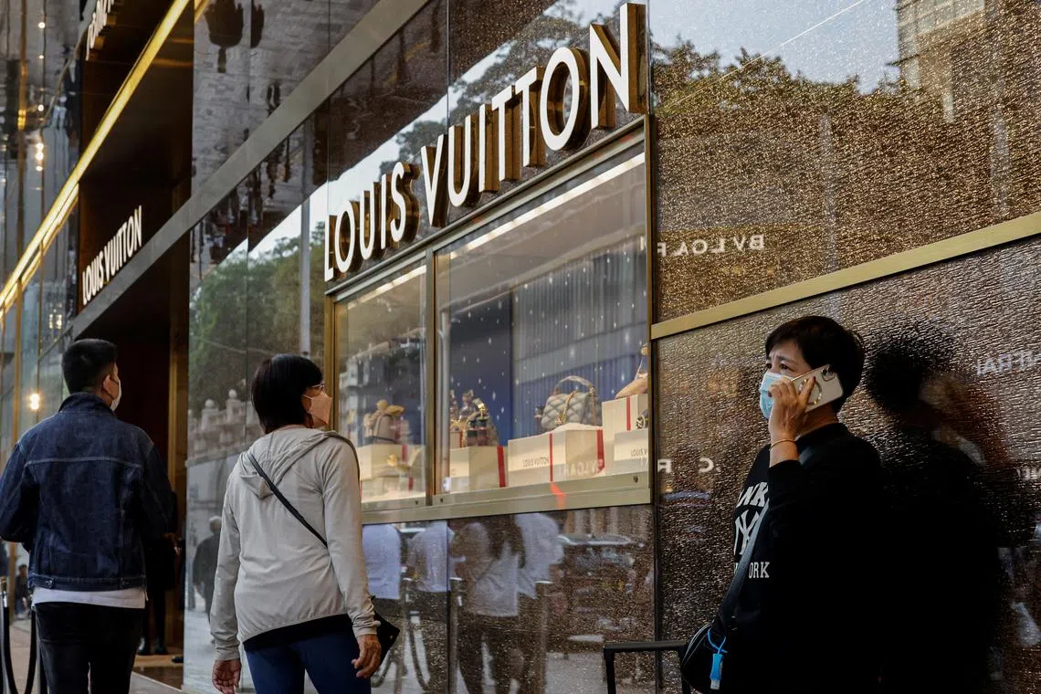 Luxury brands are lowering prices as unsold inventory piles up, with Chinese consumers becoming more frugal.