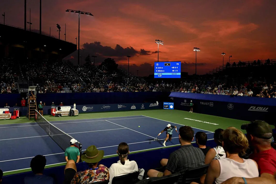 Croat Bona Coric returning a shot to Rinky Hijikata of Australia in the second round of the Winston-Salem Open at Wake Forest Tennis Complex on Aug 22.