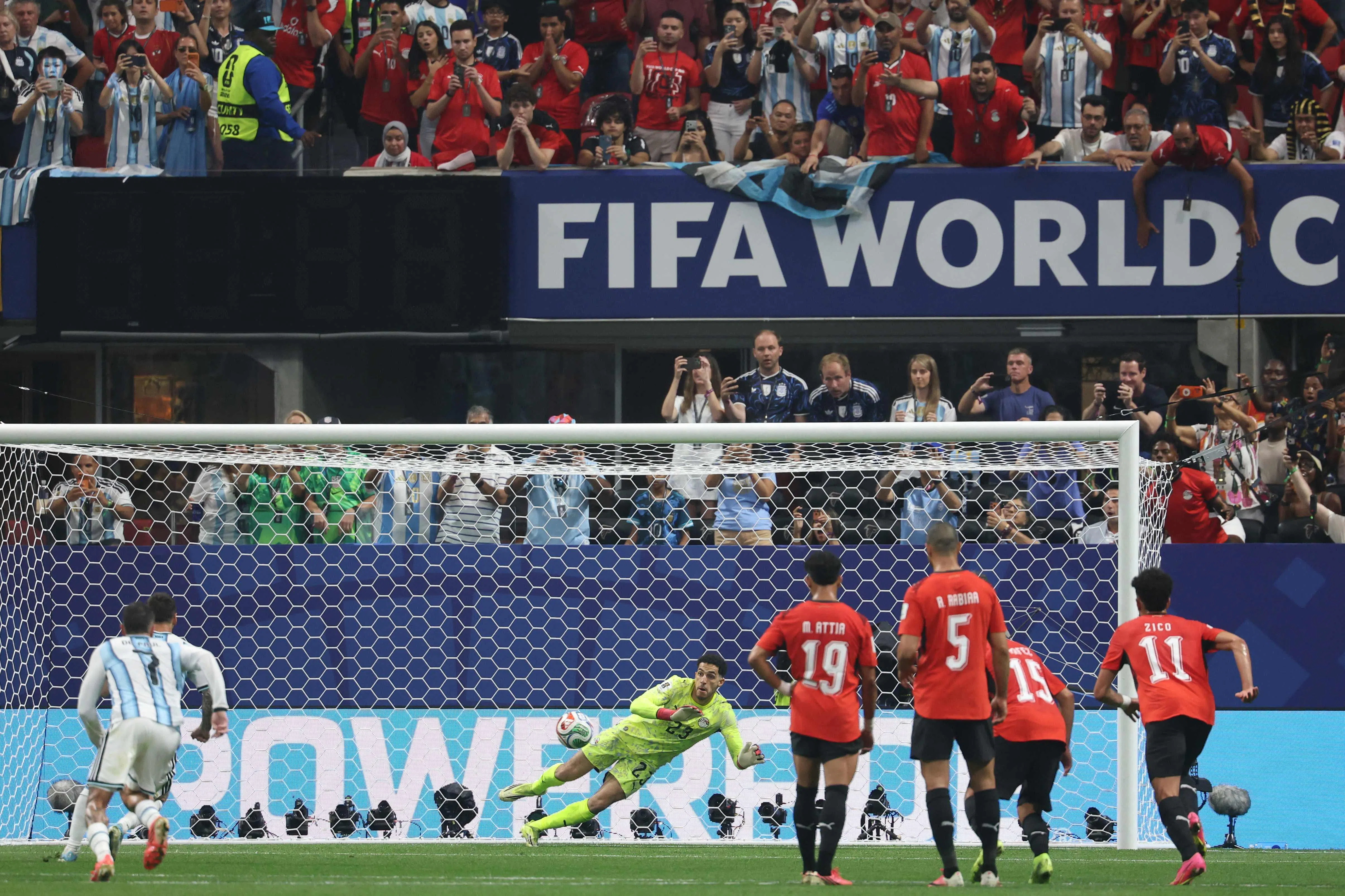 TOPSHOT - Egypt's goalkeeper #23 Mostafa Shoubir stops a penalty shoot by Argentina's forward #10 Lionel Messi during the 2026 World Cup round of 16 football match between Argentina and Egypt at Atlanta Stadium in Atlanta on July 7, 2026.  (Photo by Odd ANDERSEN / AFP)