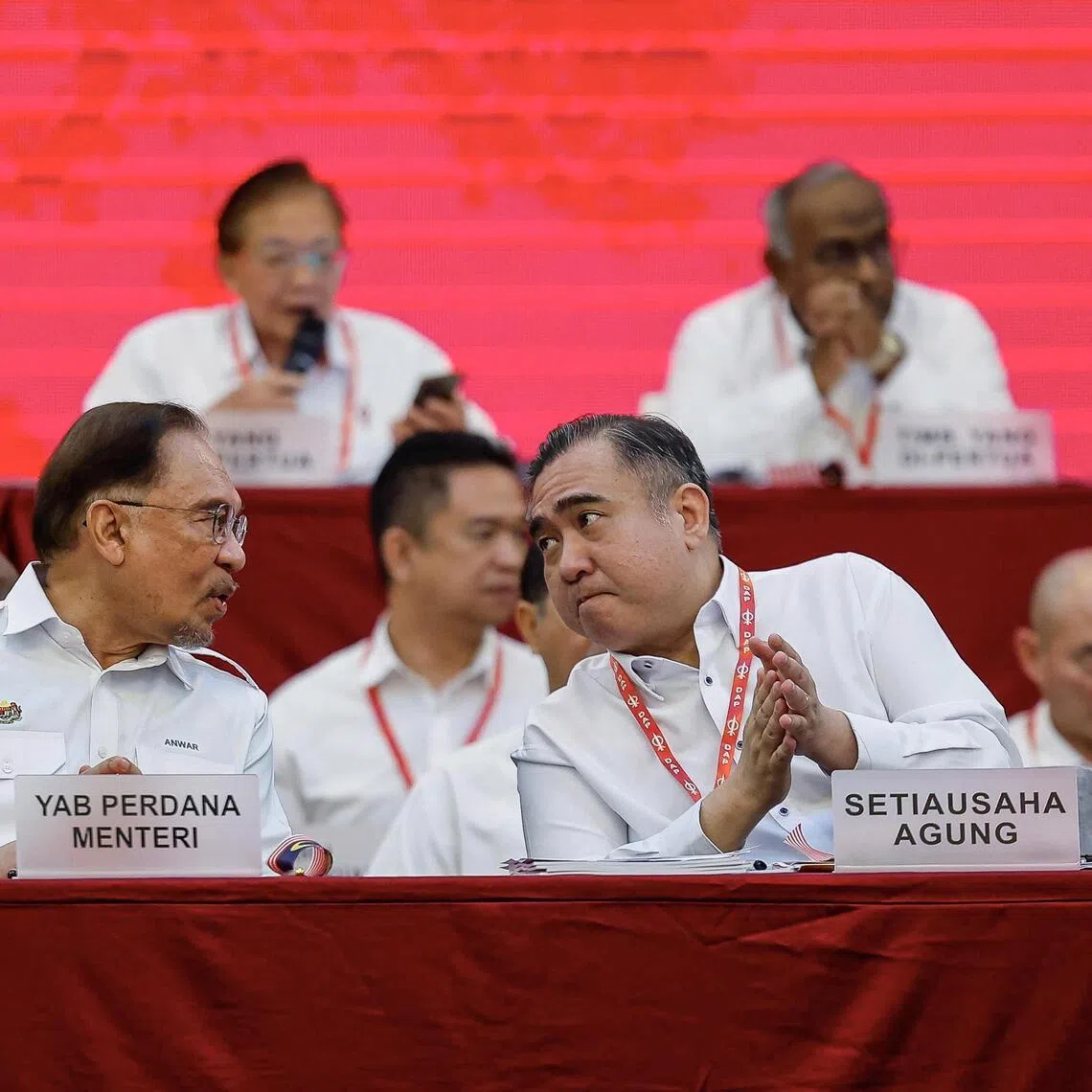 DAP secretary-general Anthony Loke (right) is putting pressure on Prime Minister Anwar Ibrahim's (left) handling of the MACC scandal.
