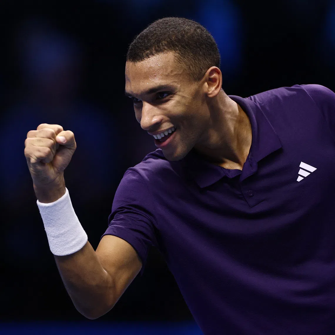 Tennis - ATP Finals - Turin - Palasport Olimpico, Turin, Italy - November 14, 2025 Canada's Felix Auger-Aliassime celebrates after winning his group stage match against Germany's Alexander Zverev REUTERS/Guglielmo Mangiapane
