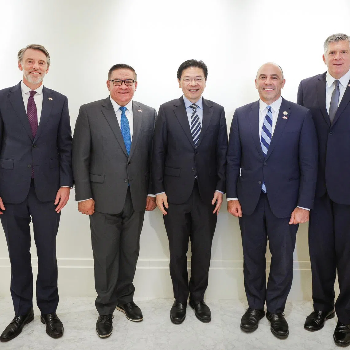 (From left) US Charge D'Affaires Casey Mace, California Representative Salud Carbajal, Singapore PM Lawrence Wong, California Representative Jimmy Panetta, Illinois Representative Darin LaHood during the US Congressional delegation visit to Singapore.