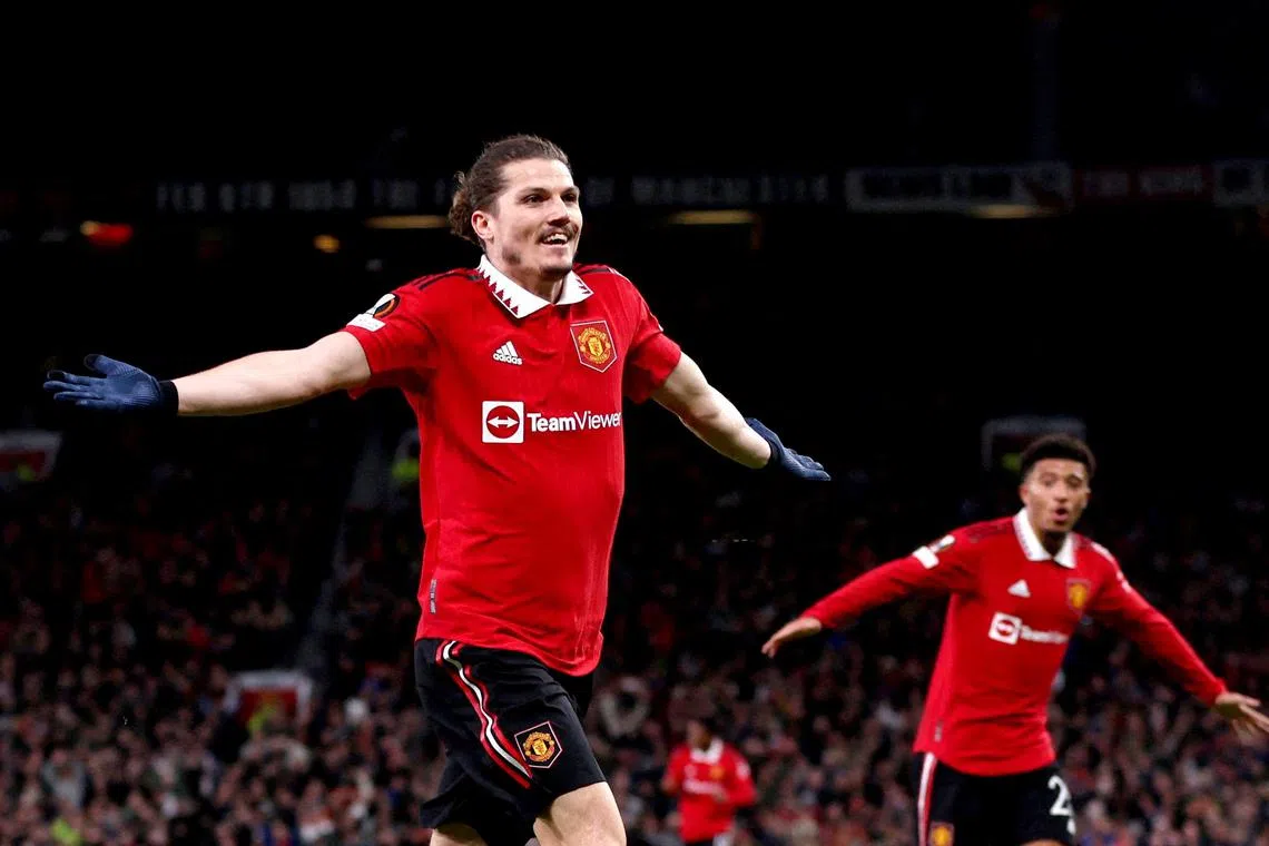 Manchester United's Marcel Sabitzer celebrates scoring his second goal against Sevilla but the Spanish side recovered to draw 2-2 in the Europa League quarter-final first-leg on Thursday.