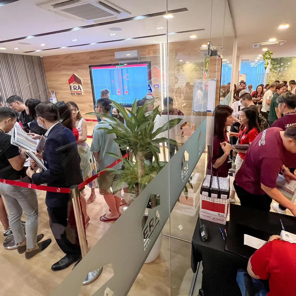 Potential buyers of Blossoms by the Park queuing to book their unit at the ERA APAC Centre in Toa Payoh, April 29, 2023.