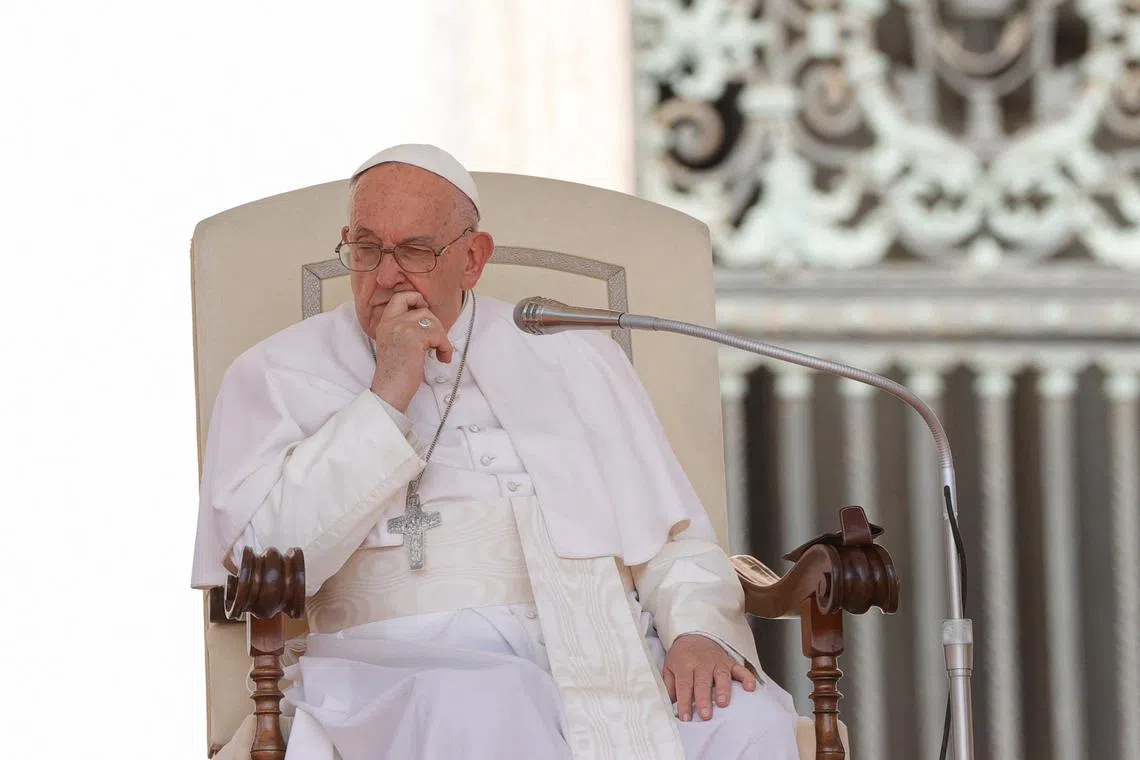 FILE PHOTO: Pope Francis attends the weekly general audience in Saint Peter Square at the Vatican, May 15, 2024. REUTERS/Ciro De Luca/File Photo