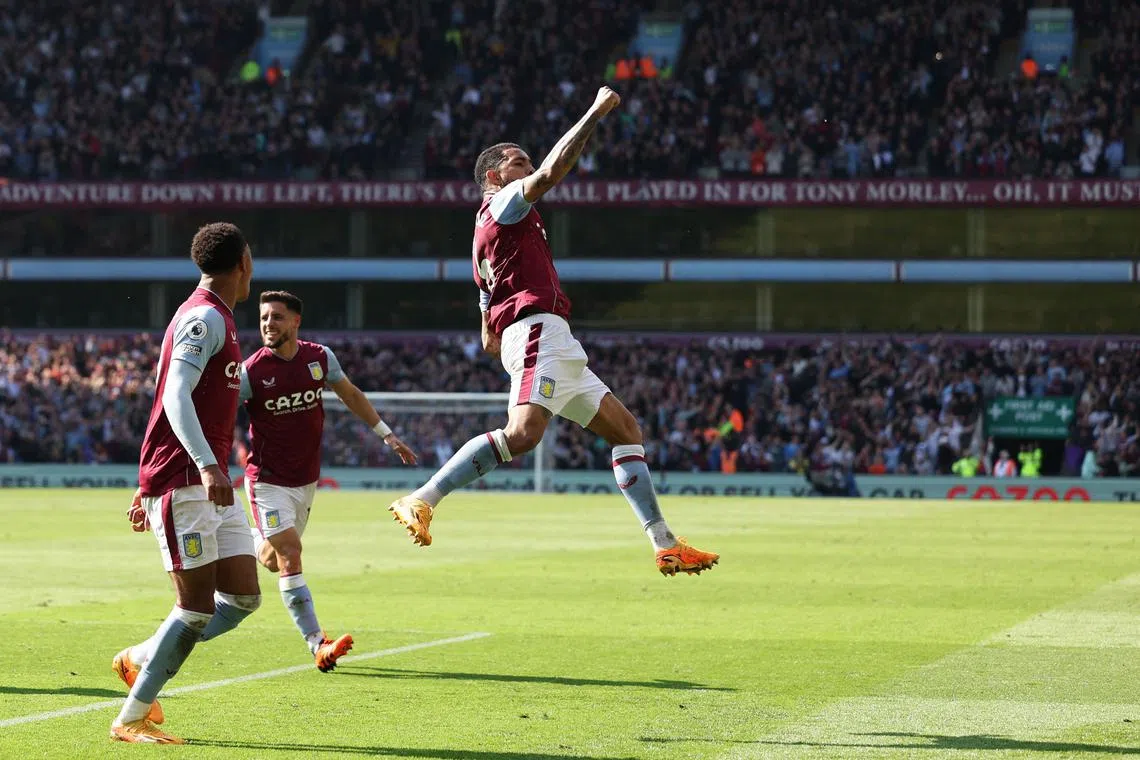 Aston Villa's Douglas Luiz (right) celebrates after scoring his team's second goal against Tottenham Hotspur.