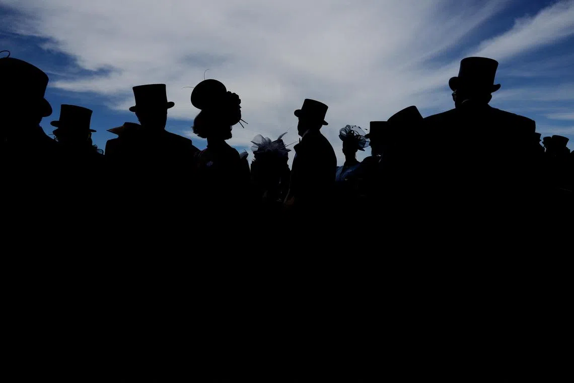 Racegoers are seen on ladies day at the Royal Ascot 2024 horse racing held at the Ascot Racecourse, in Ascot, Britain, on June 20, 2024.