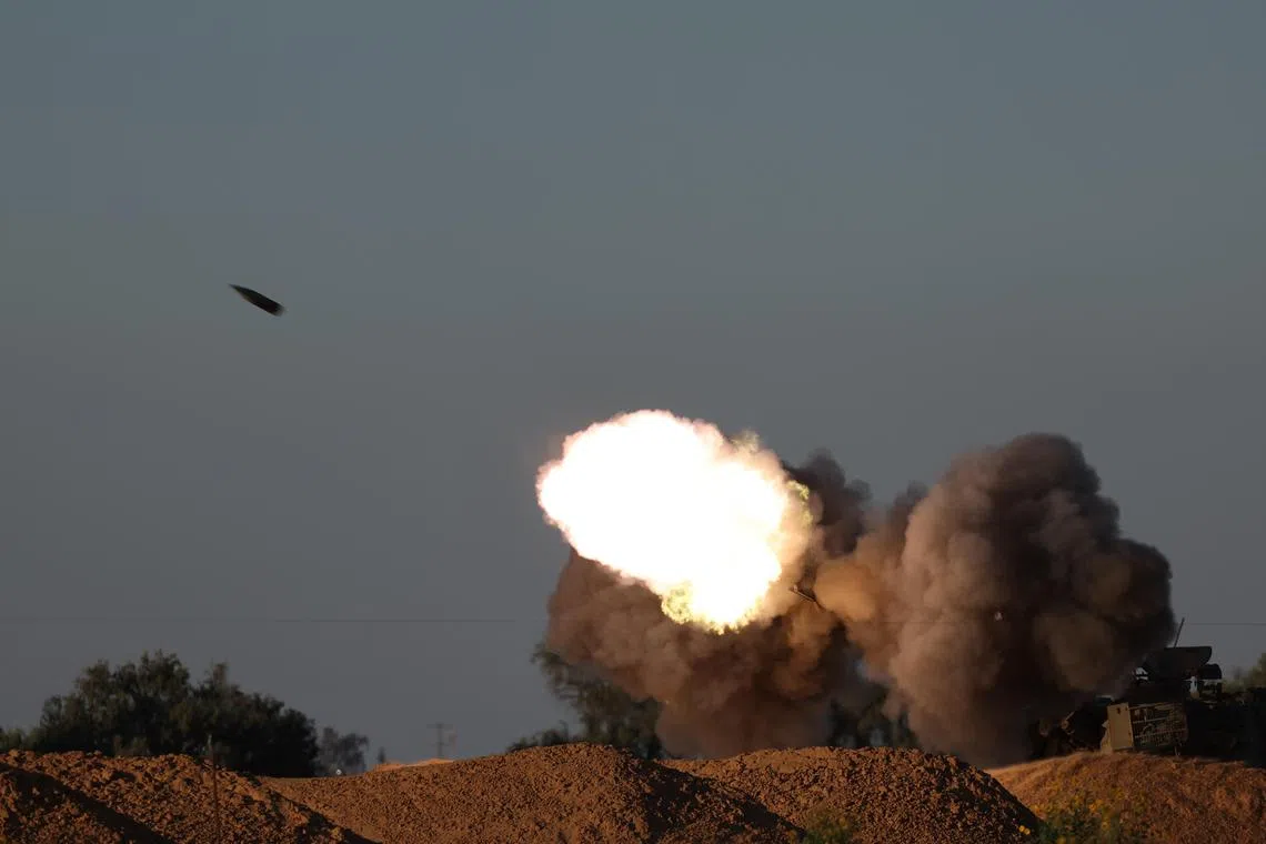 Israeli artillery fire at an undisclosed location near the border with the Gaza Strip, in southern Israel.