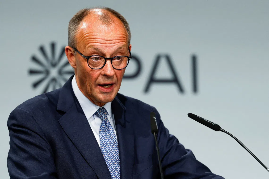 German Chancellor Friedrich Merz speaks during a groundbreaking ceremony for the IPAI CAMPUS, an artificial intelligence park, in Heilbronn, Germany, October 21, 2025. REUTERS/Heiko Becker REFILE - CHANGING FROM \"EUROPE'S LARGEST ARTIFICIAL INTELLIGENCE PARK\" TO \"AN ARTIFICIAL INTELLIGENCE PARK\".