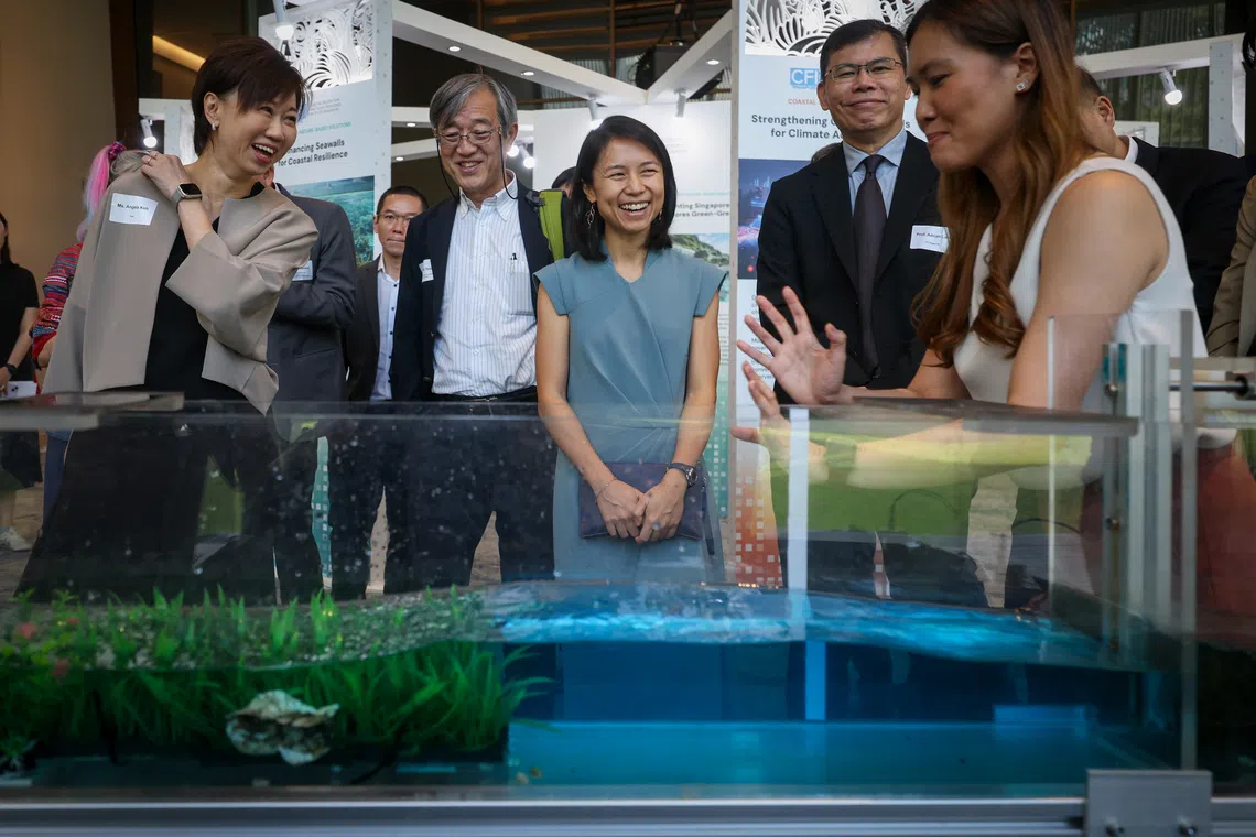 Senior Parliamentary Secretary for Sustainability and the Environment Goh Hanyan (centre) at the CFI Symposium in NUS on Sept 18.