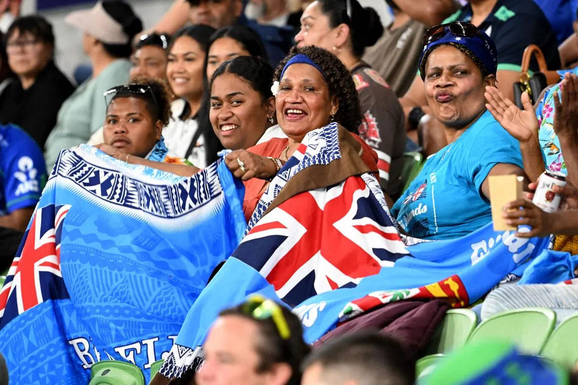 Fijian fans cheers for their team in the stands during the Super Rugby match between the NSW Waratahs and the Fijian Drua at the AAMI Park in Melbourne on March 4. They lost that game but bounced back with a historic 25-24 win over the Canterbury Crusaders in Fiji’s second city of Lautoka on Saturday.