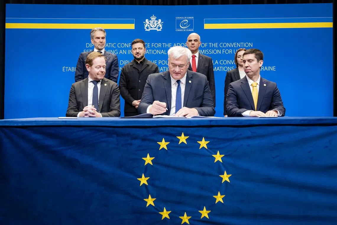 (Back row, from left) Dutch Prime Minister Dick Schoof, Ukrainian President Volodymyr Zelensky and Council of Europe Secretary-General Alain Berset attending the Dec 16 signing ceremony with Dutch Foreign Minister David van Weel (left) and Ukrainian Foreign Minister Andrii Sybiha.