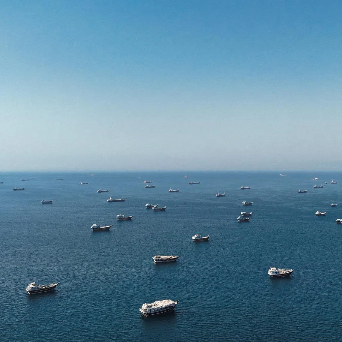 A drone view shows vessels at the Strait of Hormuz, as seen from Musandam, Oman, June 1, 2026. REUTERS/Stringer     TPX IMAGES OF THE DAY