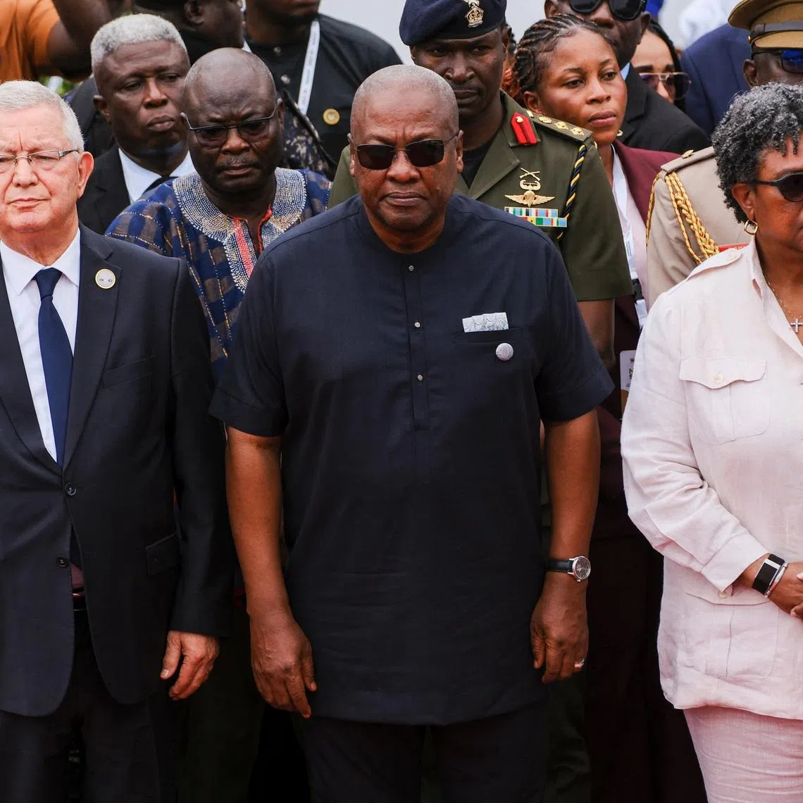 Ghana's President John Dramani Mahama, Barbados' Prime Minister Mia Amor Mottley and other dignitaries attend a wreath-laying event at the Christiansborg Castle, a former slave post, during a high-level consultative conference on the next steps to the landmark United Nations resolution on the trafficking of enslaved Africans, in Accra, Ghana, June 19, 2026. REUTERS/Francis Kokoroko