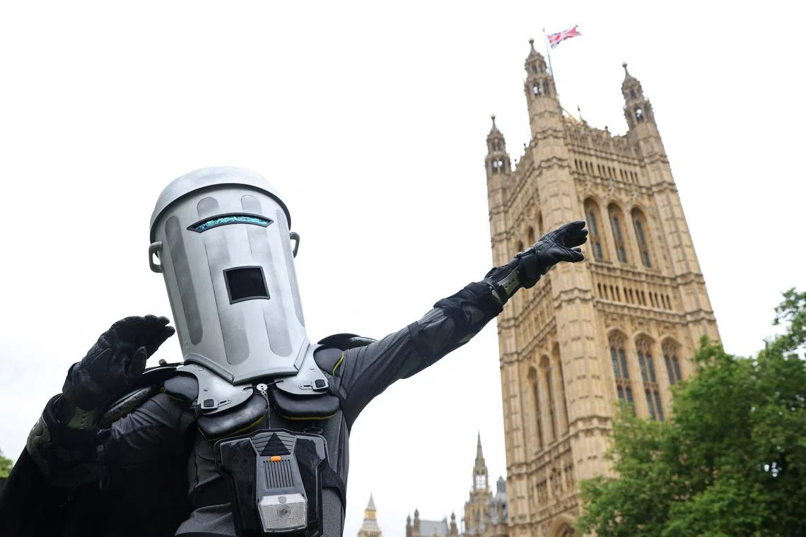 Satirical political character 'Count Binface' poses during an interview with Reuters, ahead of challenging UK Prime Minister Rishi Sunak for the parliamentary seat of Richmond and Northallerton, in the upcoming general election on July 4, outside of the Houses of Parliament in London, Britain, July 2, 2024. REUTERS/Toby Melville