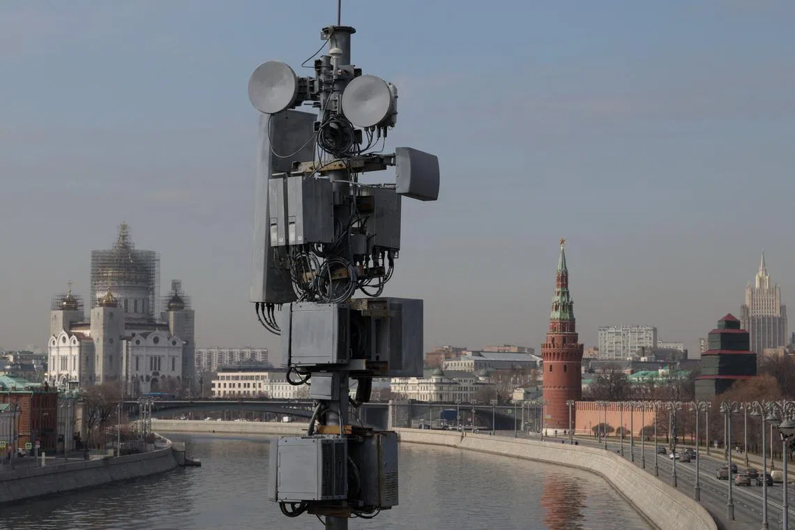 A view of a cellular tower with the Christ The Savior cathedral and the Kremlin's tower in the background in central Moscow, Russia March 27, 2026.