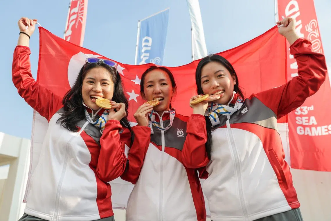 (From left) Martina Amos, Jasmine Ser and Adele Tan posing with their medals after winning gold in the 50m air rifle 3-position team event.
