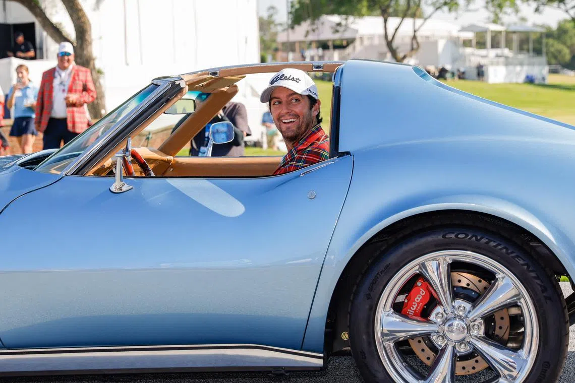 Davis Riley sitting inside the winner’s 1975 Stingray Corvette after the final round of the Charles Schwab Challenge golf tournament at Colonial Country Club in Fort Worth, Texas, on May 26.