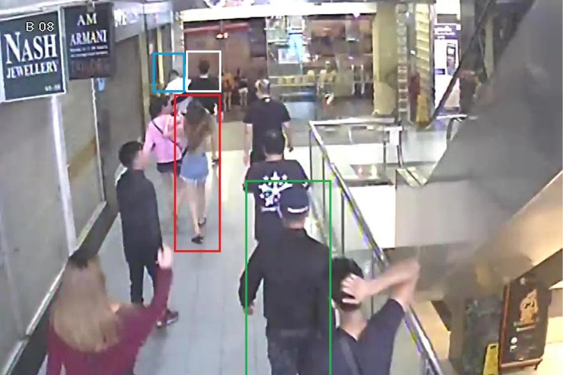 Tan Sen Yang (top left, in white) was seen on surveillance footage punching Mr Satheesh Noel Gobidass. PHOTO: COURT DOCUMENT
