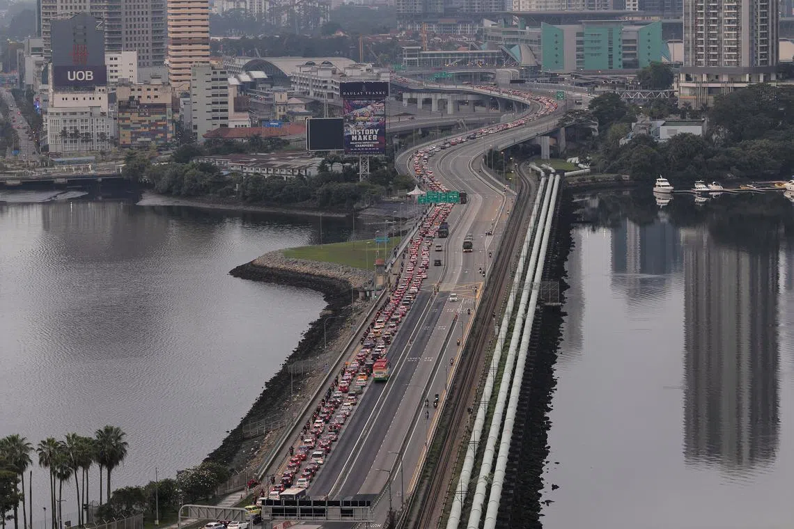 Close to 1.4 million travellers cleared the two land checkpoints over the Good Friday long weekend period from April 6 to 9.