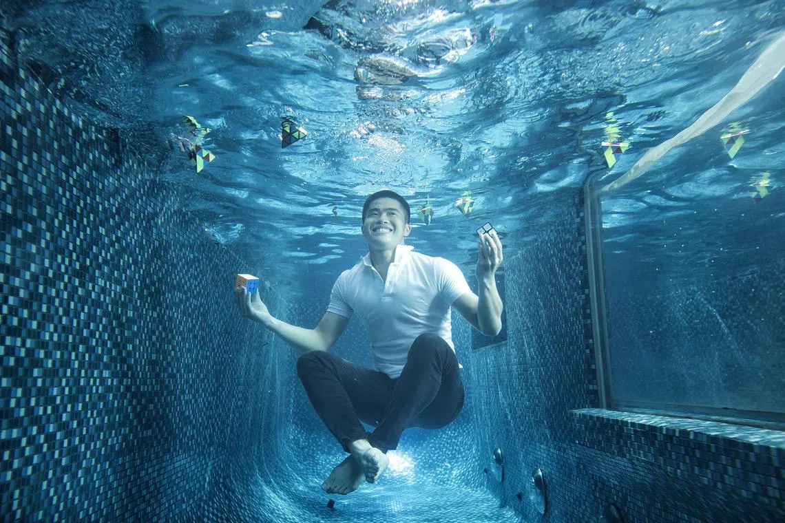 Singaporean Daryl Tan Hong An, 22, currently holds 11 Guinness World Records titles for his speedcubing feats.