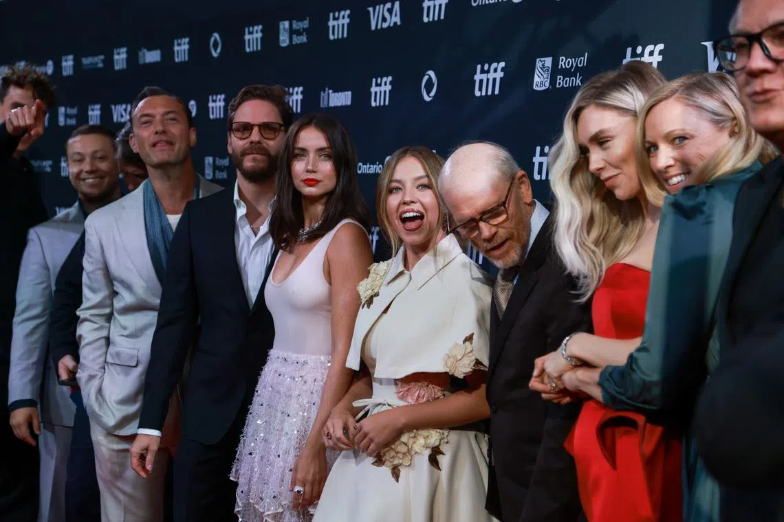 Jude Law, Ron Howard, Ana de Armas, Sydney Sweeney, Vanessa Kirby and Daniel Bruhl pose on the red carpet before screening of \"Eden\" as the Toronto International Film Festival (TIFF) returns for its 49th edition in Toronto, Ontario, Canada September 7, 2024. REUTERS/Carlos Osorio