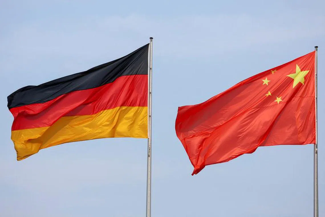 The flags of Germany and China are seen ahead of a meeting between German Chancellor Olaf Scholz and Chinese Premier Li Qiang in Berlin, Germany, June 19, 2023. REUTERS/Fabrizio Bensch